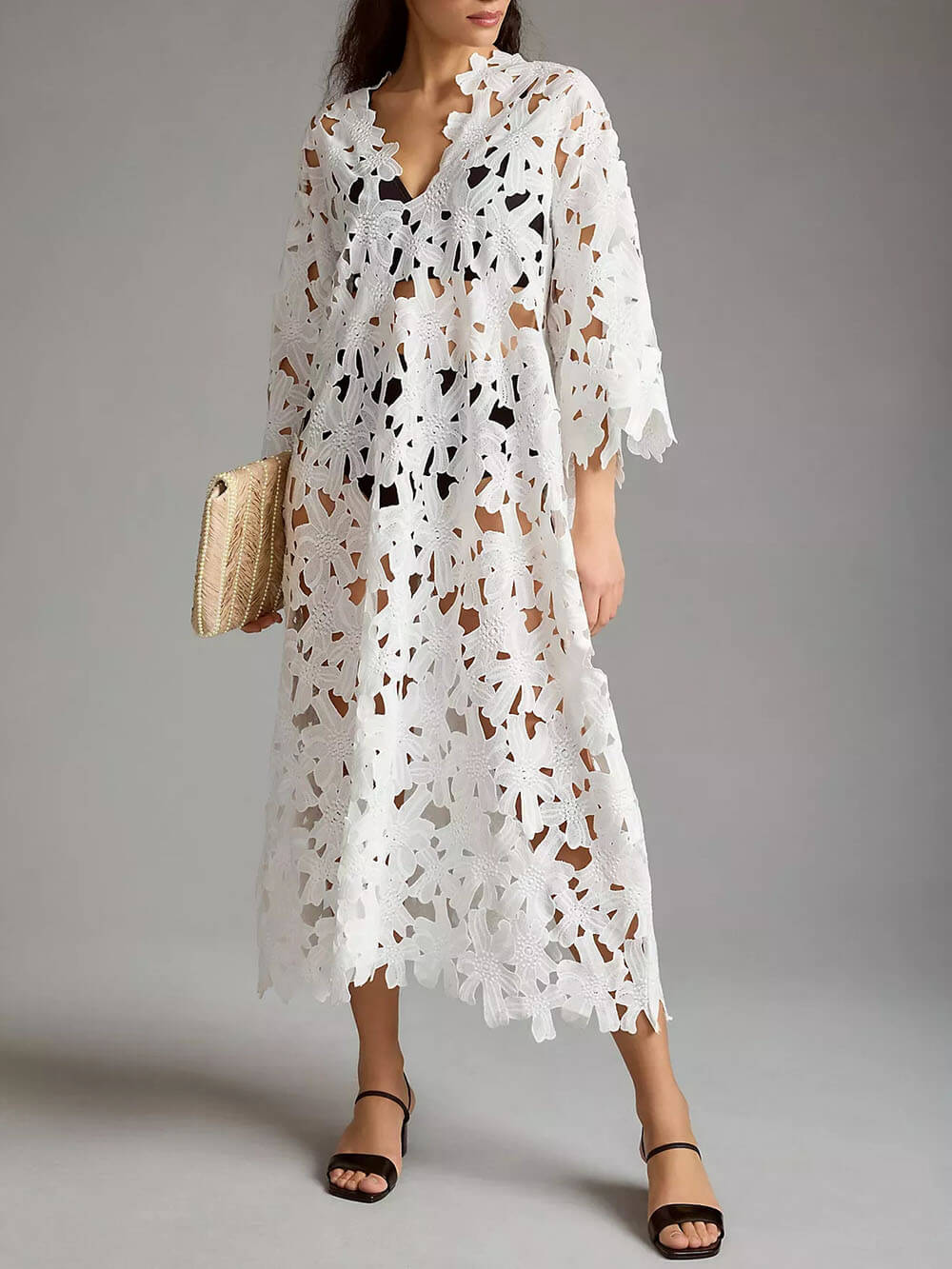 Raquel - Vestido midi de manga larga con ojales florales