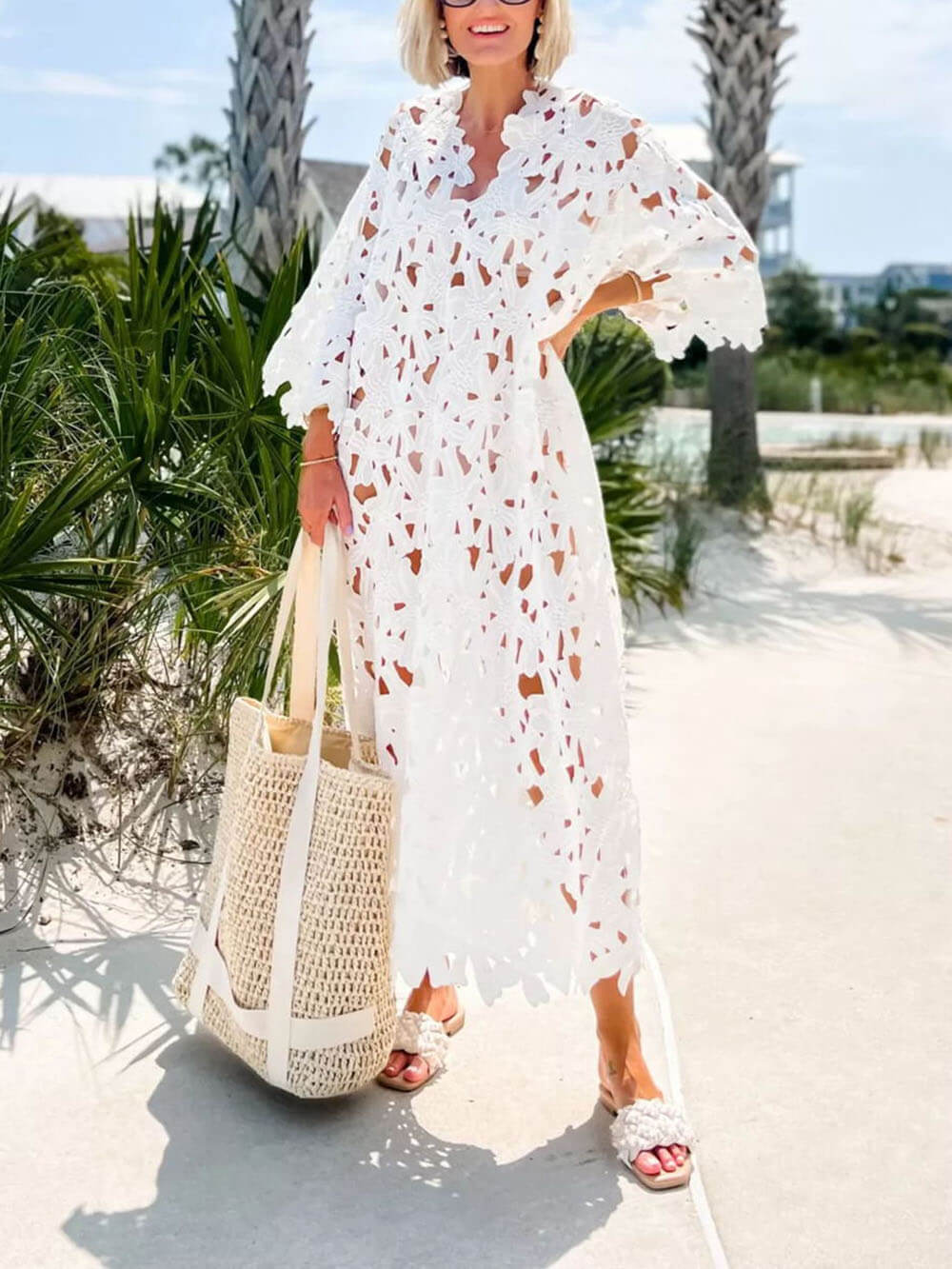 Raquel - Vestido midi de manga larga con ojales florales