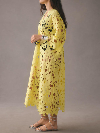 Raquel - Vestido midi de manga larga con ojales florales