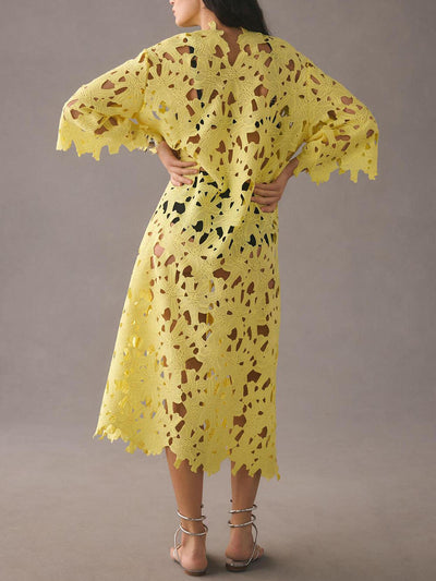 Raquel - Vestido midi de manga larga con ojales florales